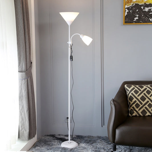 Floor lamp with reading light in a living room setting